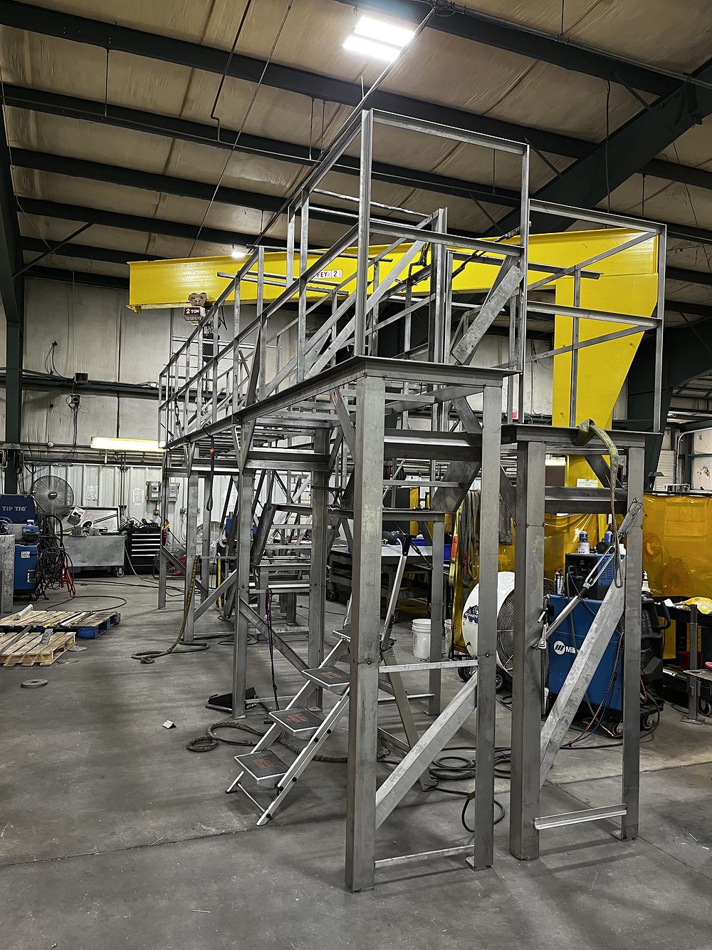 Structural stainless platform with stairs and handrail