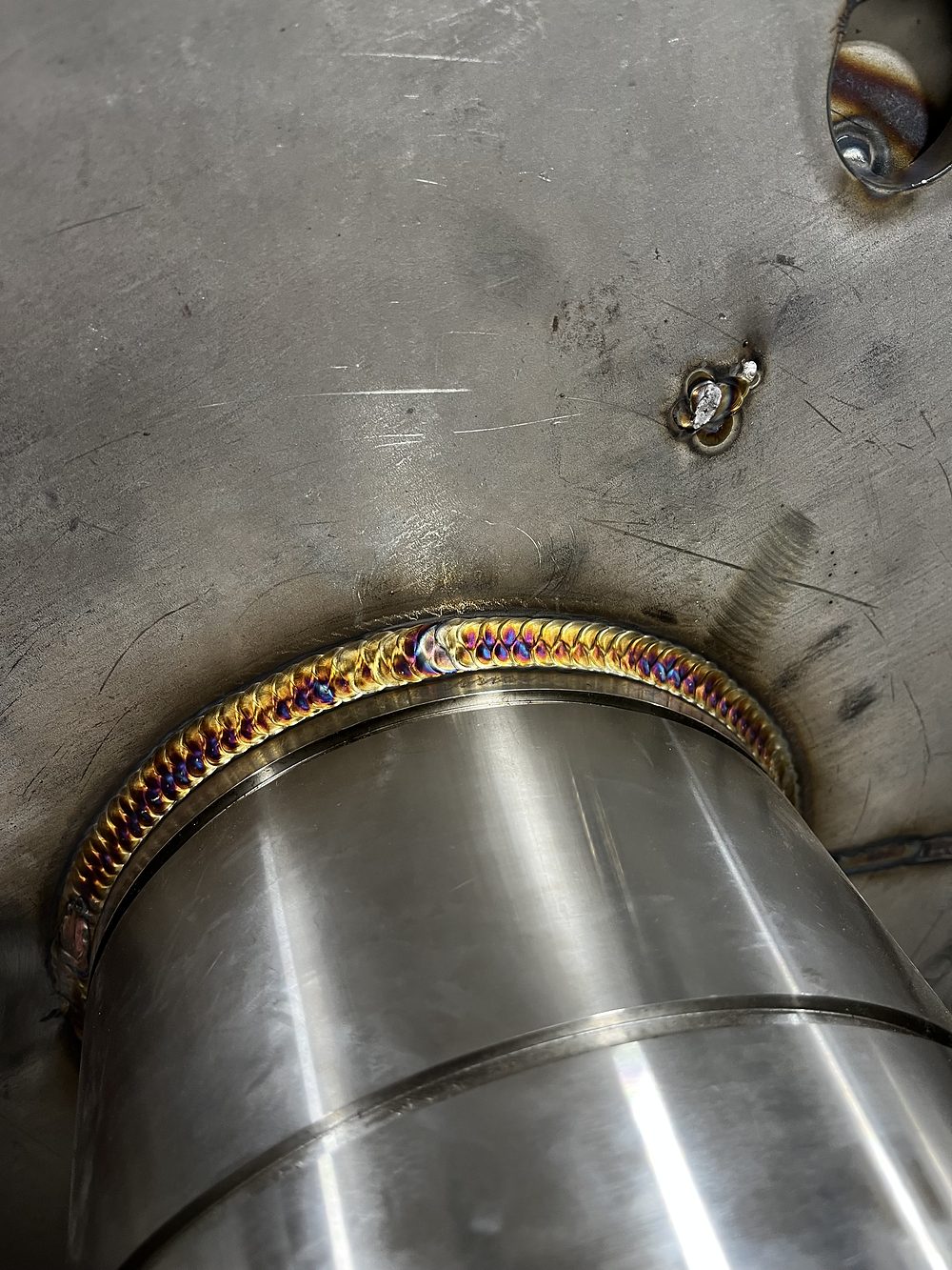 Sanitary weld at a stainless vessel nozzle